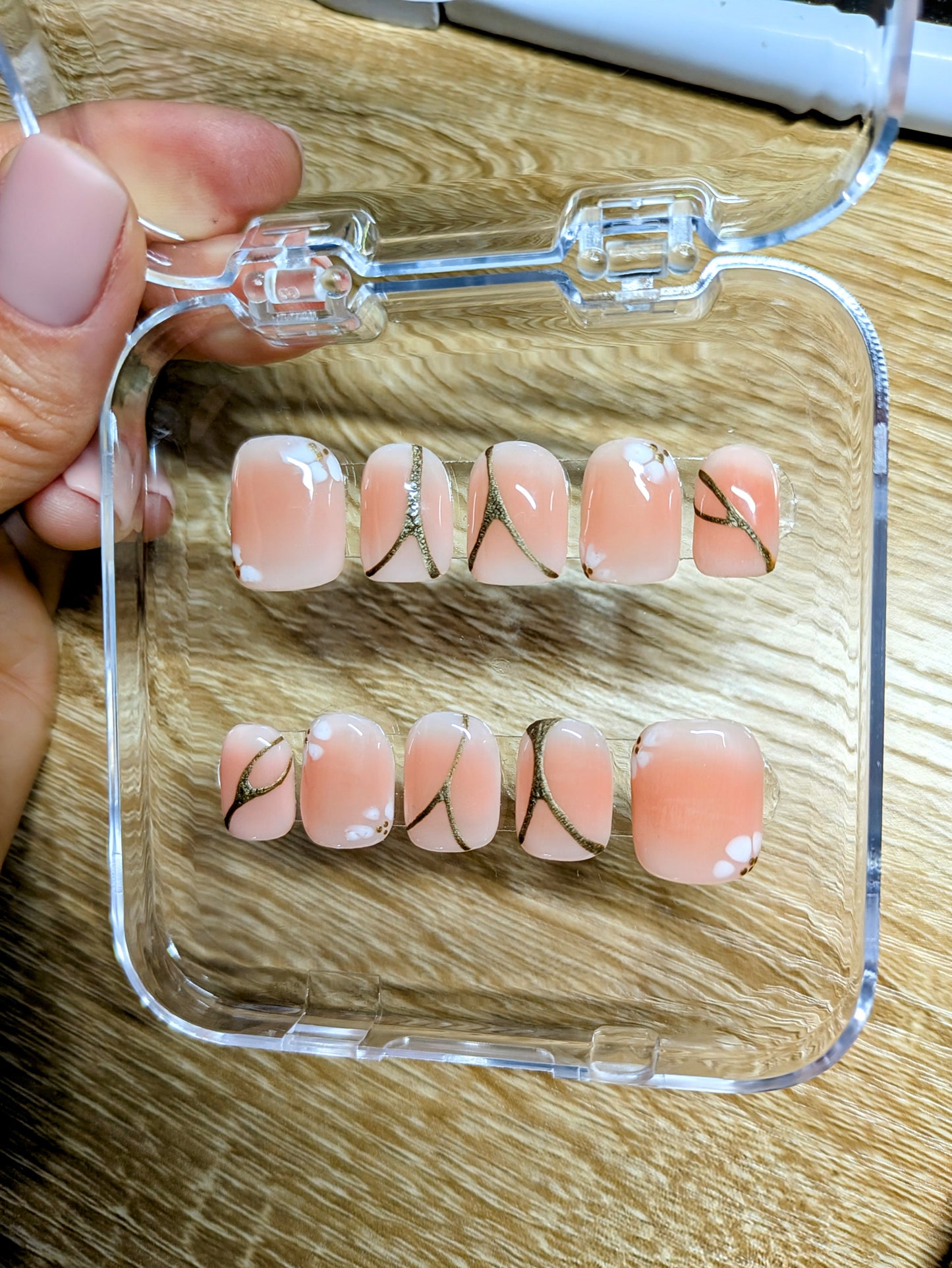 Square peachy ombre press on nails set with gold mirror details and blooming gel flowers -10 pieces
