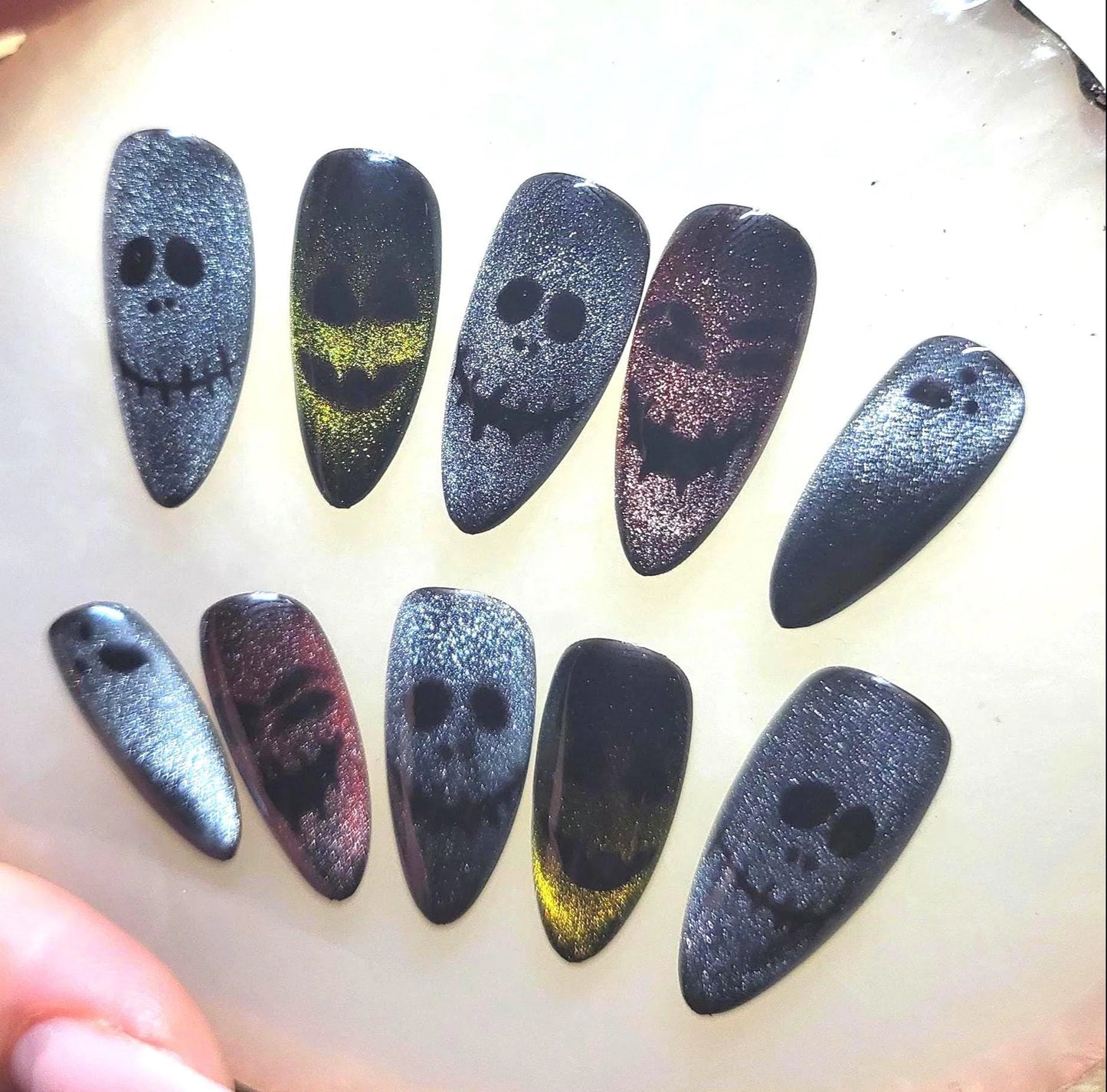 Halloween theme Inspired press on nails set with cat eye creepy faces spooky ghosts perfect for Halloween parties and events