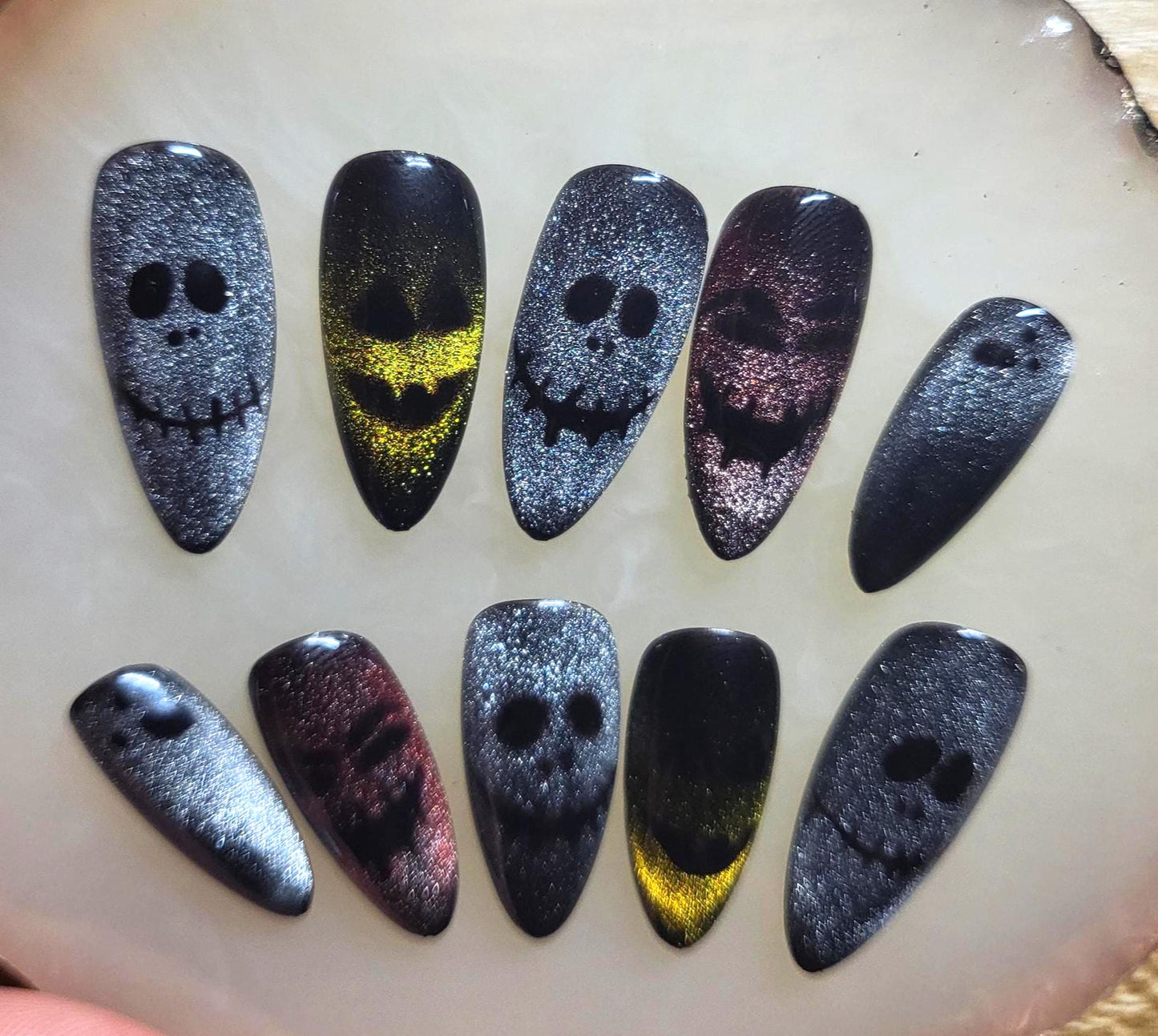 Halloween theme Inspired press on nails set with cat eye creepy faces spooky ghosts perfect for Halloween parties and events