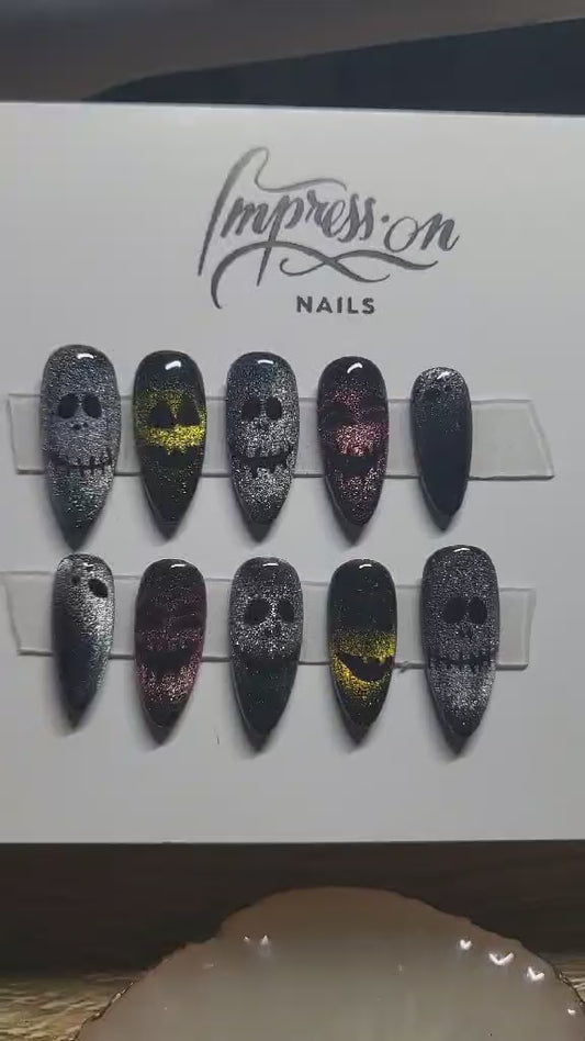 Halloween theme Inspired press on nails set with cat eye creepy faces spooky ghosts perfect for Halloween parties and events